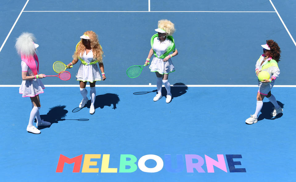Drag queens, pictured here standing beside a rainbow Melbourne sign on Pride Day at the Australian Open.
