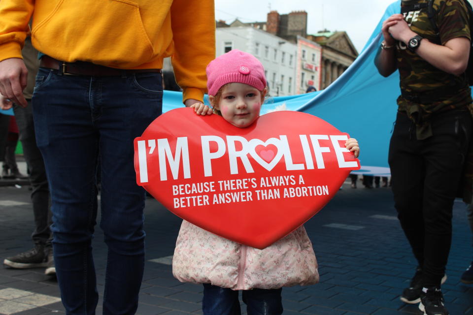 A little girl holds up a sign at&nbsp;an anti-abortion rally. (Photo: Jesselyn Cook/HuffPost)