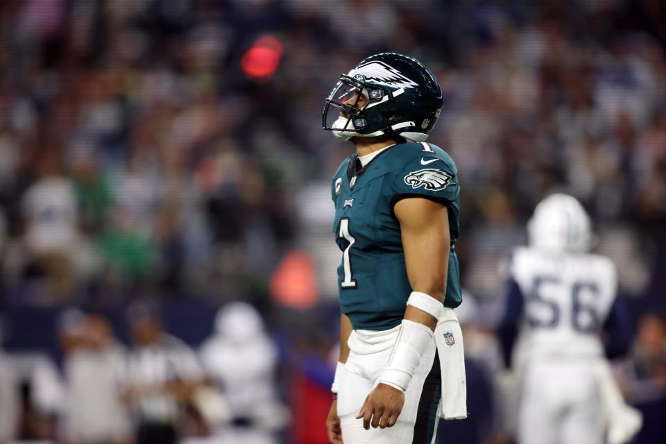 Dec 10, 2023; Arlington, Texas, USA; Philadelphia Eagles quarterback Jalen Hurts (1) reacts after a play in the game against the Dallas Cowboys at AT&T Stadium. Mandatory Credit: Tim Heitman-USA TODAY Sports