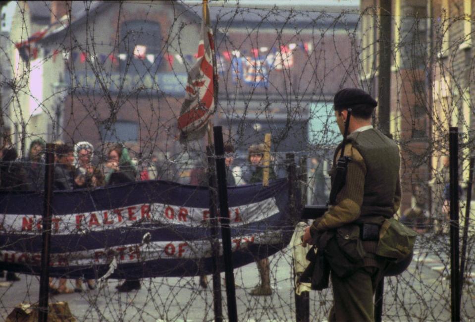 Troops in the Falls Road area of Belfast in 1969 (PA) (PA Archive)