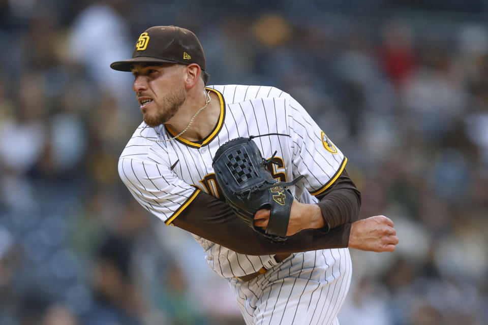 San Diego Padres starting pitcher Joe Musgrove watches a throw to a Pittsburgh Pirates batter during the first inning of a baseball game Saturday, May 28, 2022, in San Diego. (AP Photo/Mike McGinnis)