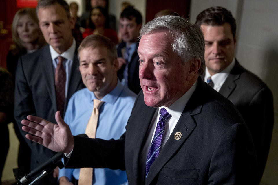 Republican lawmakers, from left, Rep. Scott Perry, R-Pa., Rep. Jim Jordan, R-Ohio, ranking member of the Committee on Oversight Reform, Rep. Mark Meadows, R-N.C., and Rep. Matt Gaetz, R-Fla., speak to reporters after a formerly planned joint committee deposition with Ambassador Gordon Sondland, with the transcript to be part of the impeachment inquiry into President Donald Trump, was canceled by order of the Trump Administration, on Capitol Hill in Washington, Tuesday, Oct. 8, 2019. T (AP Photo/Andrew Harnik)