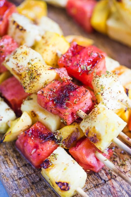 <p>Food With Feeling</p><p>Grilling fruit really brings out all the natural sweetness and flavor.</p><p><strong>Get the recipe: <a href="https://foodwithfeeling.com/grilled-fruit-skewers/" rel="nofollow noopener" target="_blank" data-ylk="slk:Grilled Fruit Skewers;elm:context_link;itc:0;sec:content-canvas" class="link ">Grilled Fruit Skewers</a></strong></p>