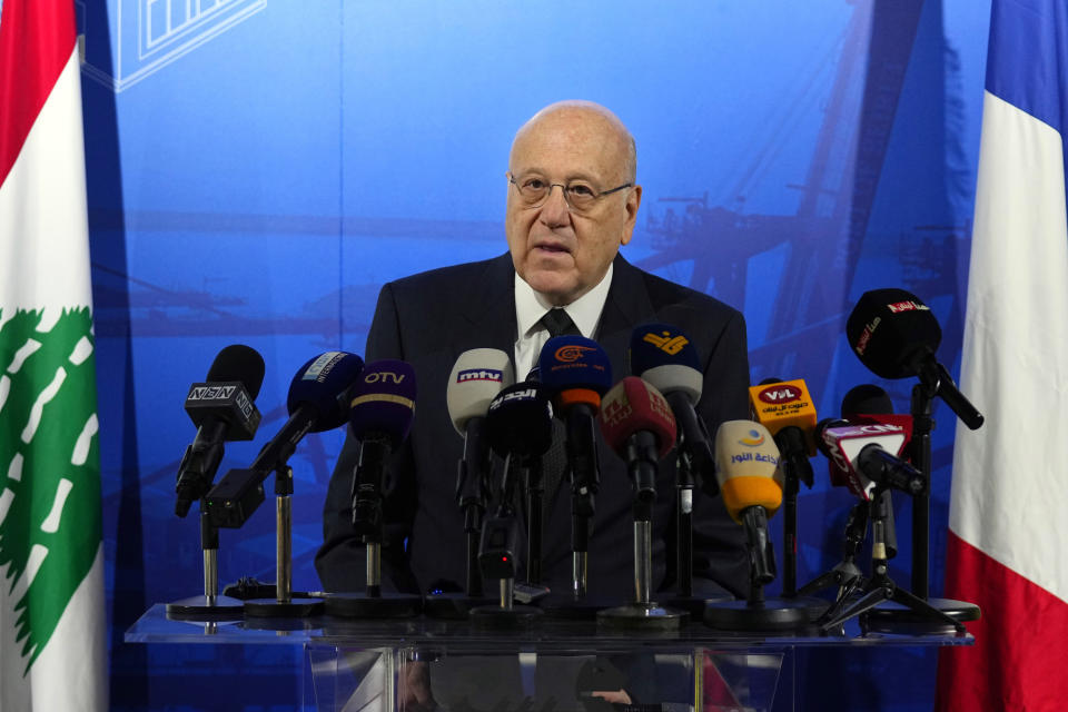 Lebanese caretaker Prime Minister Najib Mikati speaks during a conference announcing a French reconstruction plan for the Beirut Port, in Beirut, Lebanon, Wednesday, March 13, 2024. Three and a half years after hundreds of tons of improperly stored ammonium nitrate ignited at the Beirut port, setting off one of the world's biggest non-nuclear explosions, Lebanese and French officials put forward a plan for reconstruction and reorganization of the port Wednesday. (AP Photo/Bilal Hussein)
