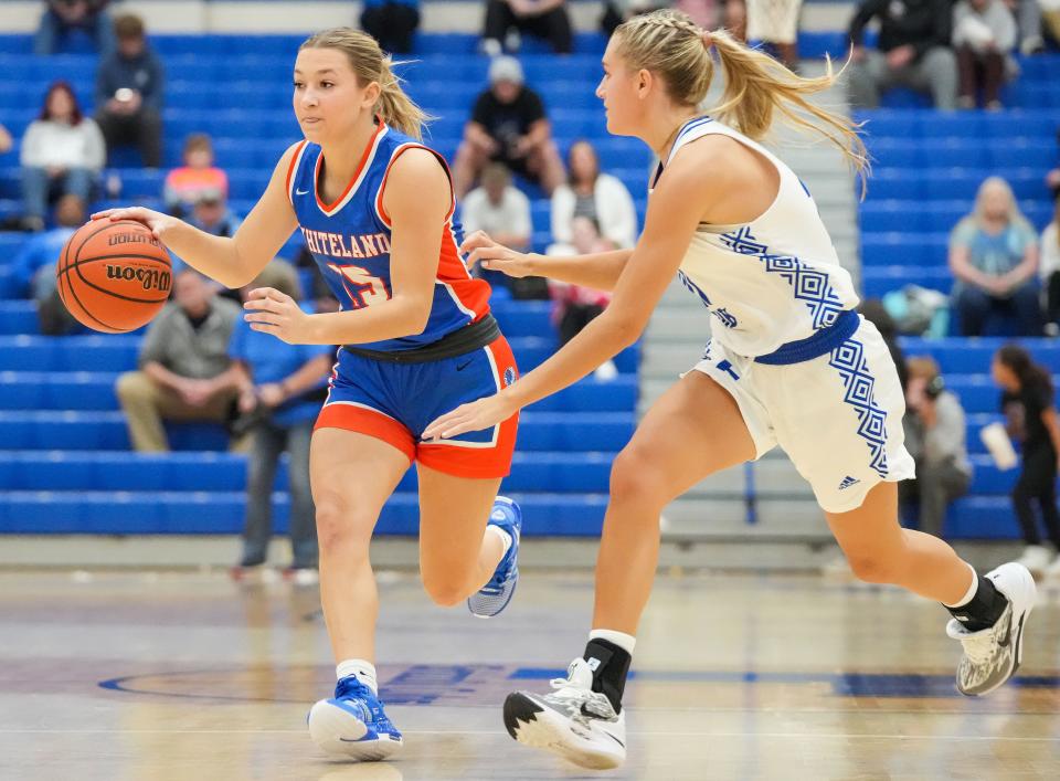 Whiteland's guard Addison Emberton (15) rushes up the court Thursday, Nov. 16, 2023, during the semifinals of the Johnson County Tournament at Franklin Community High School in Franklin. The Franklin Community Grizzley Cubs defeated the Whiteland, 68-30.