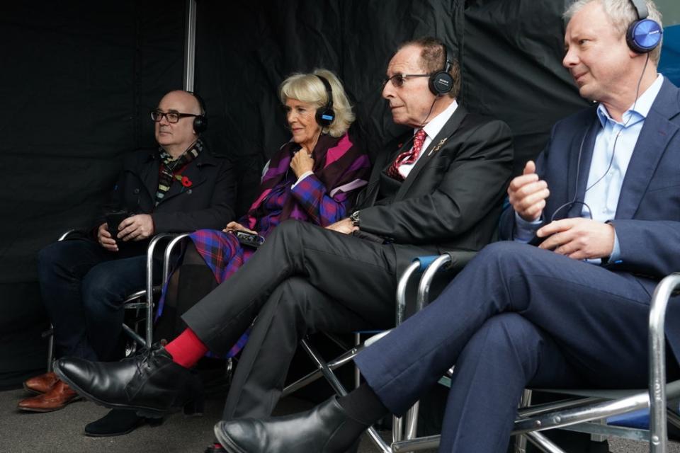 The Duchess of Cornwall with Peter James, centre right, and actor John Simm, right, watch filming in progress (Gareth Fuller/PA) (PA Wire)