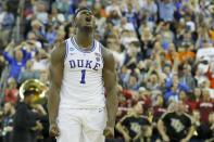 <p>Zion Williamson #1 of the Duke Blue Devils celebrates with his teammates after defeating the UCF Knights in the second round game of the 2019 NCAA Men’s Basketball Tournament at Colonial Life Arena on March 24, 2019 in Columbia, South Carolina. (Photo by Kevin C. Cox/Getty Images) </p>