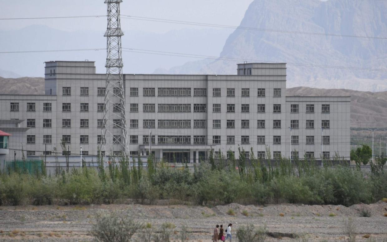 (FILES) This file photo taken on June 2, 2019 shows a facility believed to be a re-education camp where mostly Muslim ethnic minorities are detained, in Artux, north of Kashgar in China's western Xinjiang region. - Canada on January 12, 2021 announced a ban on the import of goods suspected of being made using forced labor in China's restive Xinjiang region, following a similar move by Britain. In a statement, the foreign ministry said it was "gravely concerned with evidence and reports of human rights violations" against Xinjiang's Muslim Uighurs and other ethnic minorities in the autonomous northwestern region.  - GREG BAKER/AFP via Getty Images