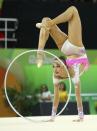 <p>Marina Durunda (AZE) of Azerbaijan competes using the hoop. (Reuters) </p>