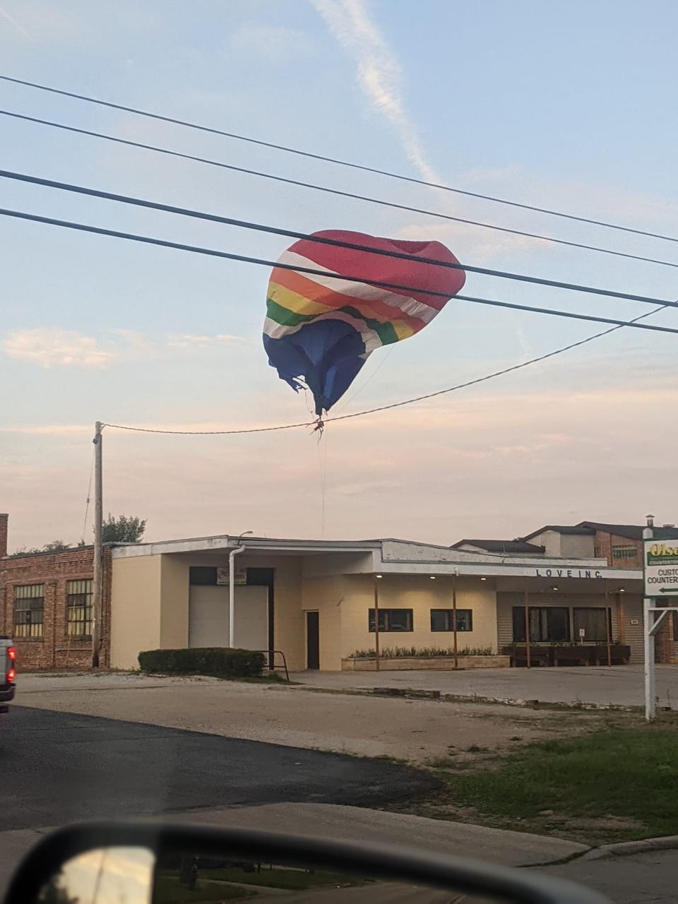 Police said a hot air balloon crashed into a train