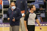 Referee Brian Forte, right, walks away from New Orleans Pelicans coach Stan Van Gundy after discussing a call during the first quarter of an NBA basketball game against the Sacramento Kings in Sacramento, Calif., Sunday, Jan. 17, 2021. (AP Photo/Rich Pedroncelli)