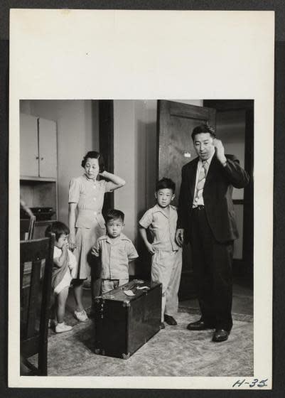 Mr. and Mrs. Oshima and their three small children, all recently arrived from the Tule Lake Relocation Center