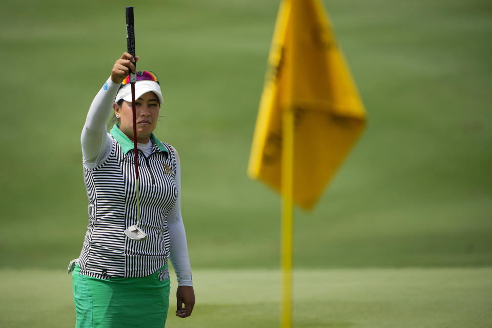 Jasmine Suwannapura of Thailand lines up a putt on the 18th hole during the second round of the LPGA Maybank Championship in Kuala Lumpur, Malaysia, Friday, Oct. 27, 2023. (AP Photo/Vincent Thian)