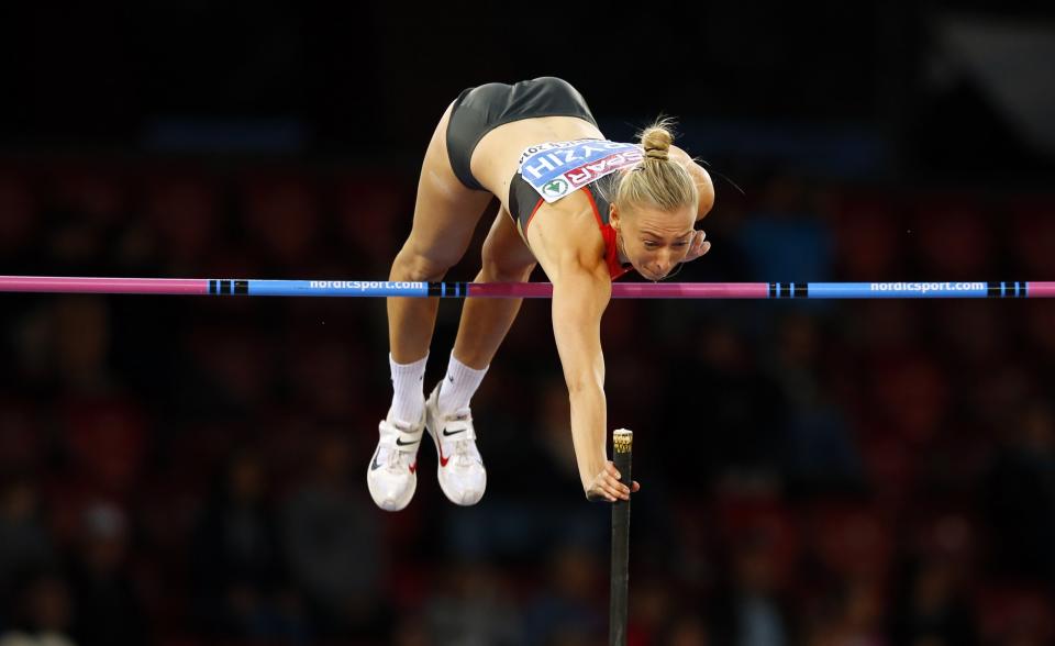 Lisa Ryzih of Germany competes in the women's pole vault during the European Athletics Championships at the Letzigrund Stadium in Zurich in this August 14, 2014 file photo. REUTERS/Phil Noble/Files (SWITZERLAND - Tags: TPX IMAGES OF THE DAY SPORT ATHLETICS)