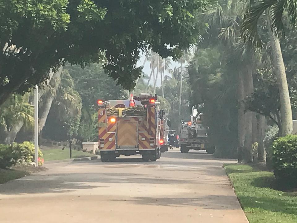 Firefighters battle a fire that broke out on the roof of a three-story beachside condominium building in south county around 2 pm June 30, 2022. Smoke billowed from the top of the southeast building of the u-shaped Southwinds complex in the 2200 block of North Southwinds Drive on State Road A1A. No one was injured.