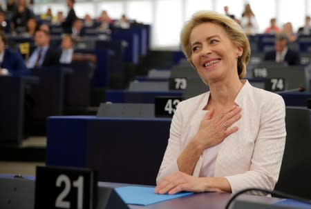 Elected European Commission President Ursula von der Leyen reacts after a vote on her election at the European Parliament in Strasbourg