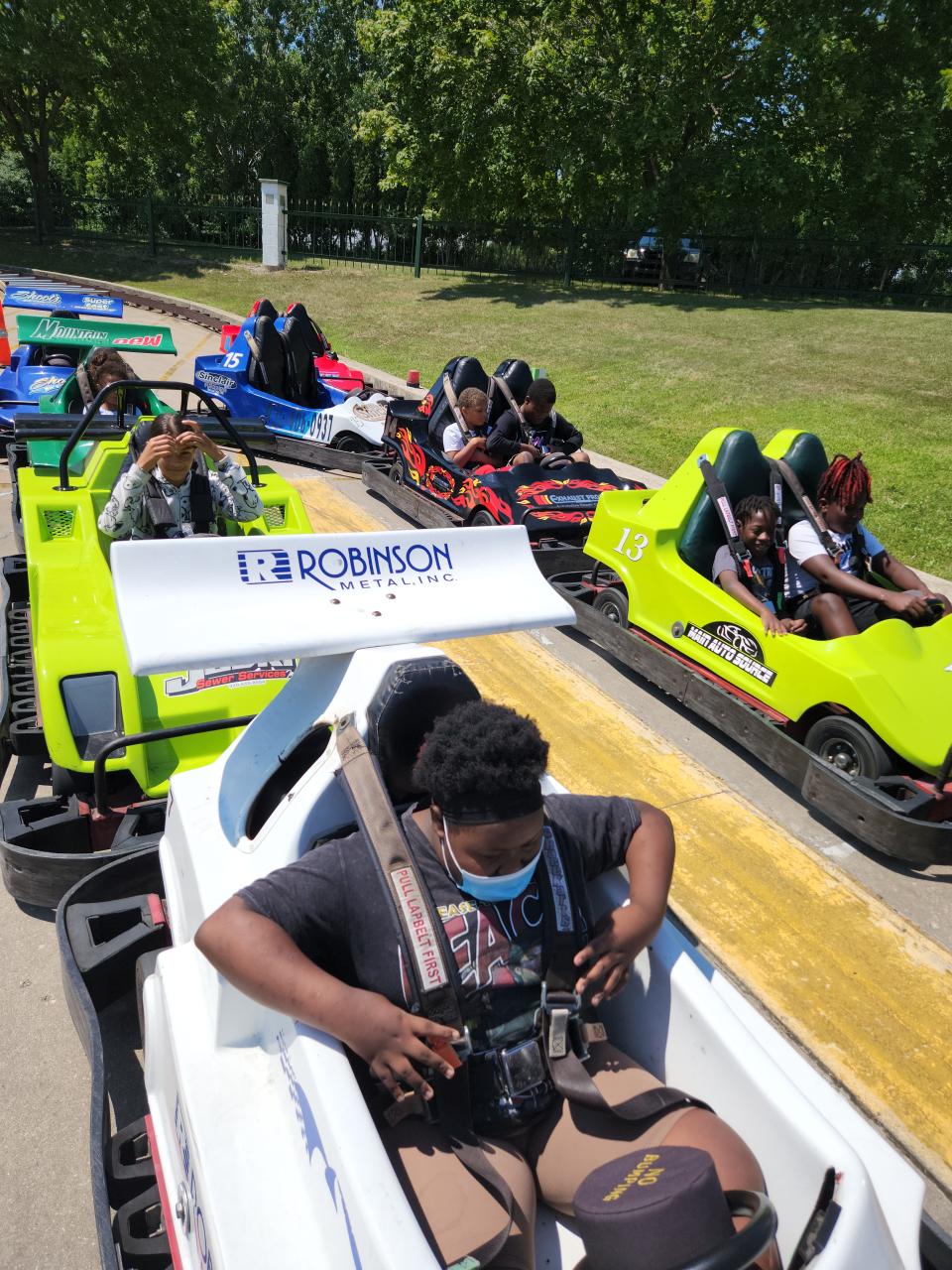 Black Youth Alliance participants at Kastle Karts go-kart track in Green Bay for one of their field trips during the summer 2022 programming.