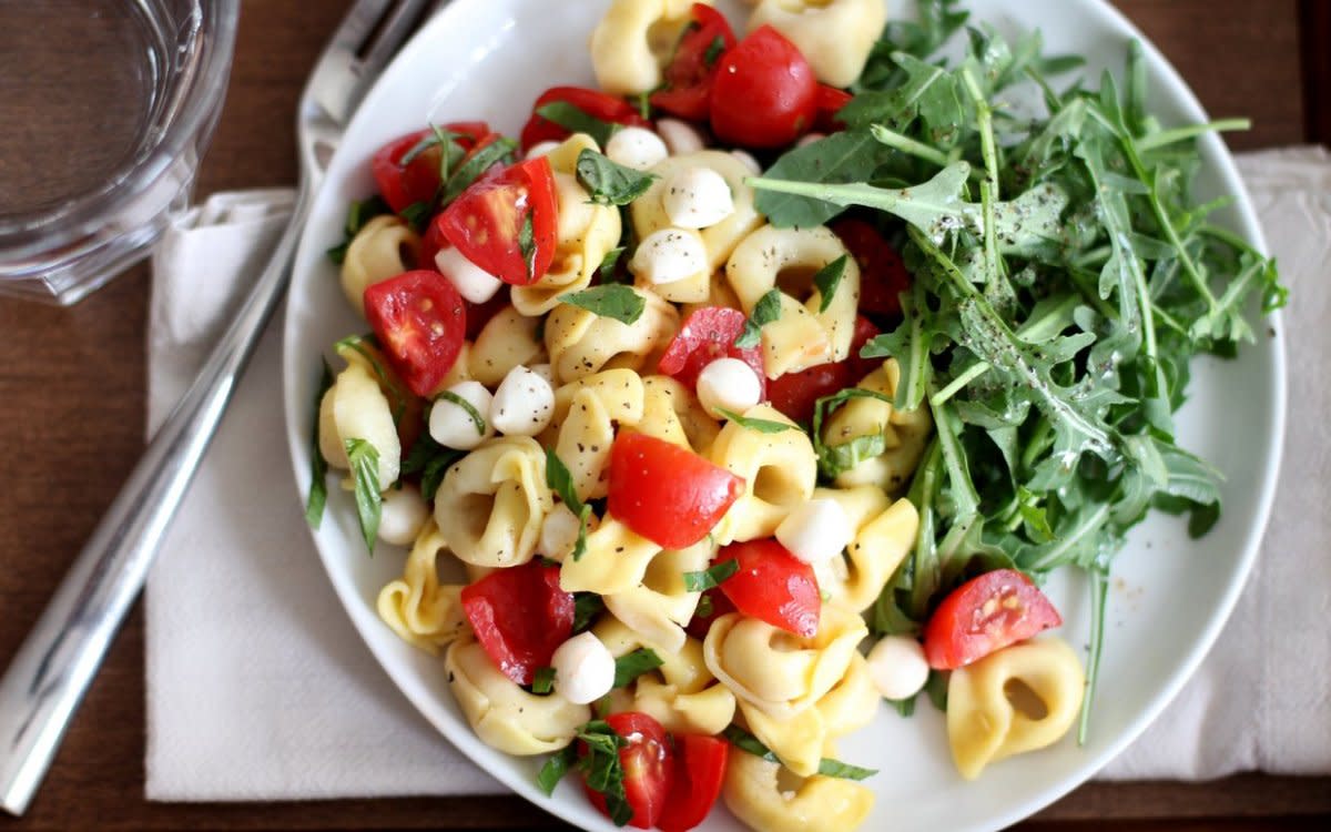 <p><strong>Get the recipe: <a href="/19084/jessicasmith/a-refreshing-pasta-salad-for-hot-summer-days/" data-ylk="slk:Tortellini Pasta Salad With Tomato, Basil And Mozzarella;elm:context_link;itc:0;sec:content-canvas" class="link rapid-noclick-resp">Tortellini Pasta Salad With Tomato, Basil And Mozzarella</a></strong></p><p>Jessica Smith</p>