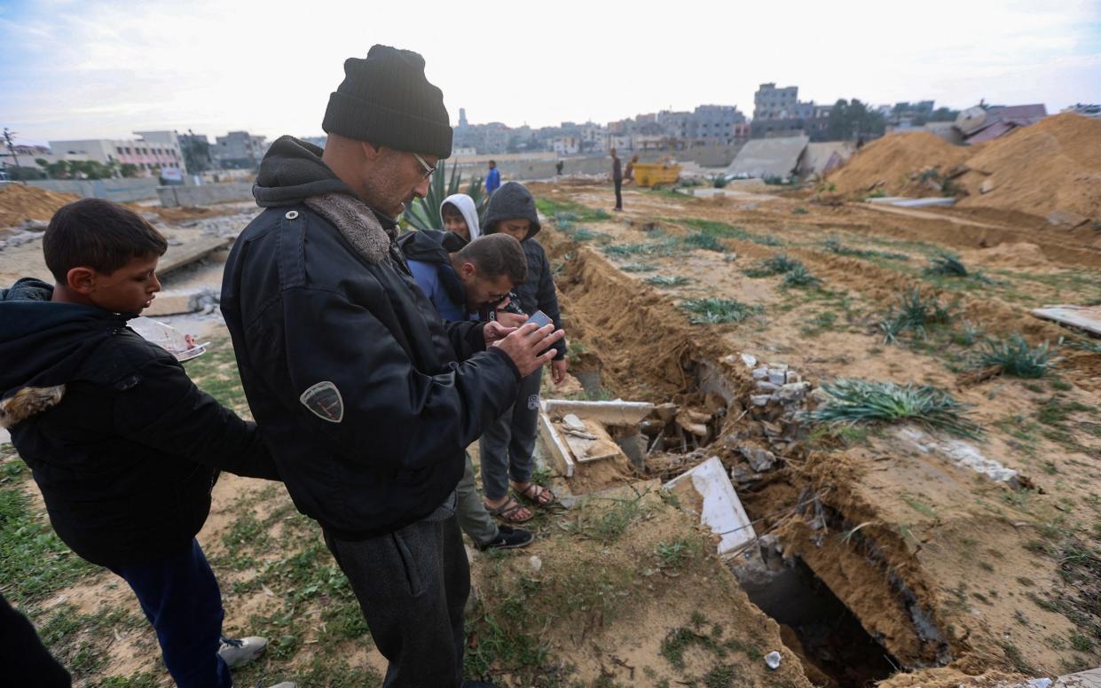 Damaged graves at a cemetery where the IDF has admitted digging up bodies