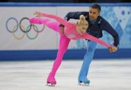 Germany's Aliona Savchenko and Robin Szolkowy compete during the Figure Skating Pairs Short Program at the Sochi 2014 Winter Olympics, February 11, 2014. REUTERS/Alexander Demianchuk (RUSSIA - Tags: OLYMPICS SPORT FIGURE SKATING)