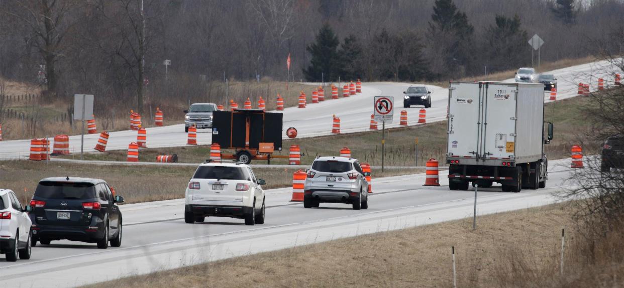 Travelers experience a sea of orange construction barrels along Interstate 43 south of the Rockwood overpass, Friday, April 29, 2022, in Manitowoc, Wis.