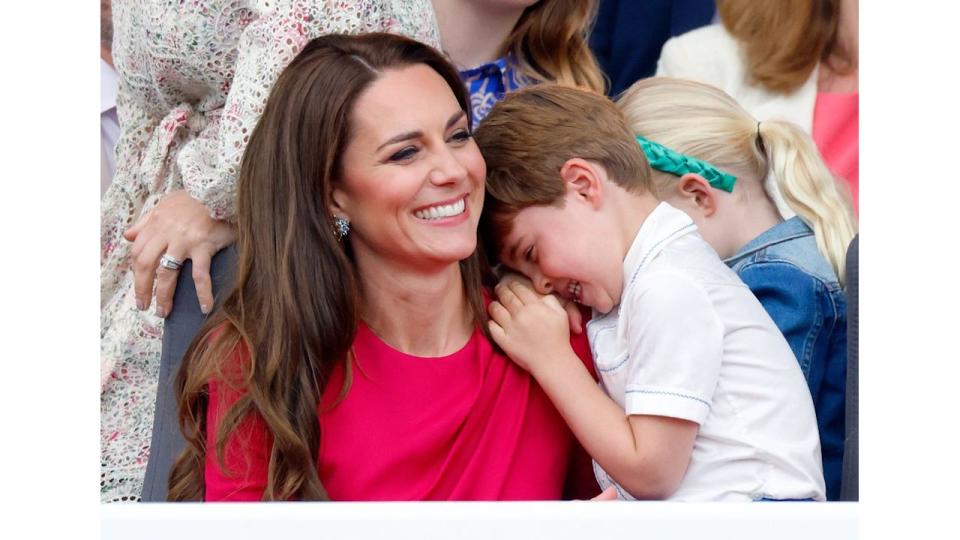 Prince Louis hugging Kate Middleton