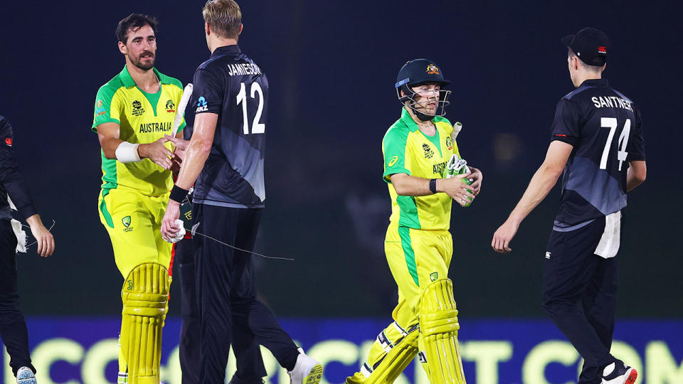 Mitchell Starc and Josh Inglis, pictured here after Australia's victory over New Zealand.