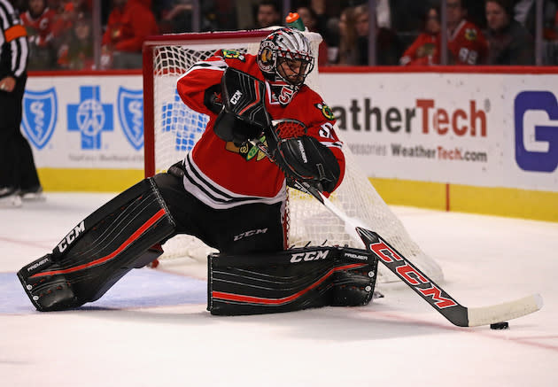 CHICAGO, IL - OCTOBER 04: Corey Crawford #50 of the Chicago Blackhawks controls the puck against the Detroit Red Wings during a preseason game at the United Center on October 4, 2016 in Chicago, Illinois. (Photo by Jonathan Daniel/Getty Images)