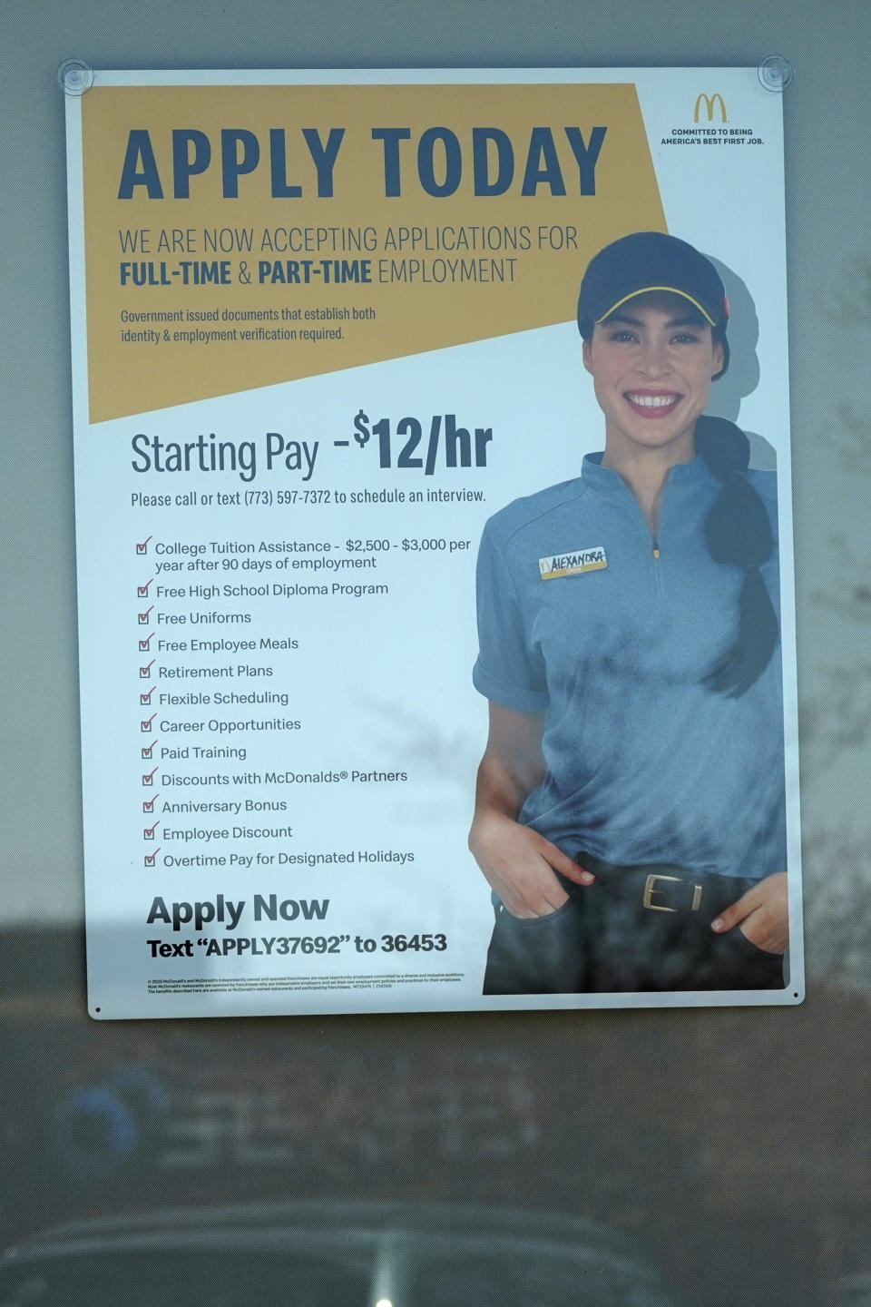 A hiring information sign is displayed at a fast food restaurant in Des Plaines, Ill., Friday, April 2, 2021. America's employers unleashed a burst of hiring in March, adding 916,000 jobs in a sign that a sustained recovery from the pandemic recession is taking hold as vaccinations accelerate, stimulus checks flow through the economy and businesses increasingly reopen. (AP Photo/Nam Y. Huh)