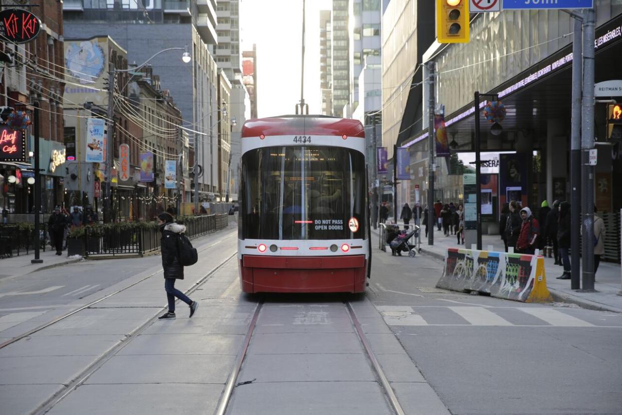 A TTC streetcar is pictured here at King and John Streets in Toronto. (John Rieti/CBC - image credit)