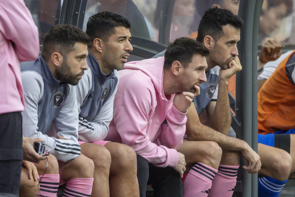 HONG KONG, CHINA - FEBRUARY 4: (from L to R) Jordi Alba, Luis Suarez, Lionel Messi and Sergio Busquets of Inter Miami CF sit on the bench during the preseason friendly match between Hong Kong Team and Inter Miami at Hong Kong Stadium on February 4, 2024 in Hong Kong, China. (Photo by Edmund So/Eurasia Sport Images/Getty Images)