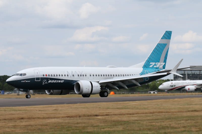 A Boeing Max 737 is seen on display at the Farnborough International Air Show in Farnborough, United Kingdom. Boeing supplier Spirit AeroSystems, which makes fuselages for the Max 737, said it will lay off up to 450 Wichita, Kan., employees due to slowed delivery rates. Photo by Cityswift/Flickr