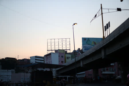 An empty billboard stands on buildings in Caracas, Venezuela March 22, 2019. REUTERS/Ivan Alvarado