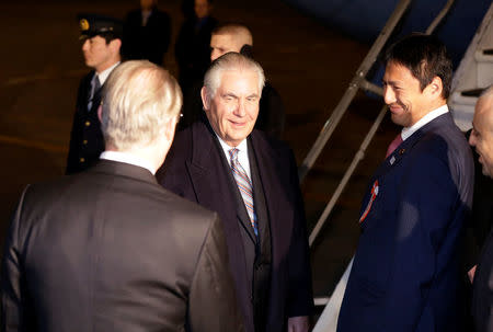 U.S. Secretary of State Rex Tillerson, second left, arrives during his first trip to Asia as Secretary, at Haneda International Airport in Tokyo, Wednesday, March 15, 2017. REUTERS/Eugene Hoshiko/Pool