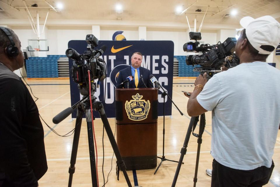 Aubrey Blackwell is interviewed after being introduced as the new football coach at Saint James High School in Montgomery, Ala., on Wednesday, March 27, 2024.