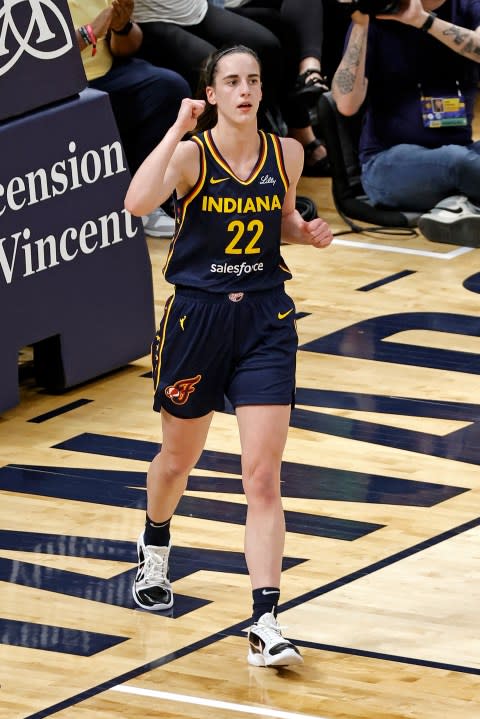 INDIANAPOLIS, IN – MAY 09: Indiana Fever guard Caitlin Clark (22) reacts after making a shot and getting fouled against the Atlanta Dream during a WNBA preseason game on May 9, 2024, at Gainbridge Fieldhouse in Indianapolis, Indiana. (Photo by Brian Spurlock/Icon Sportswire via Getty Images)