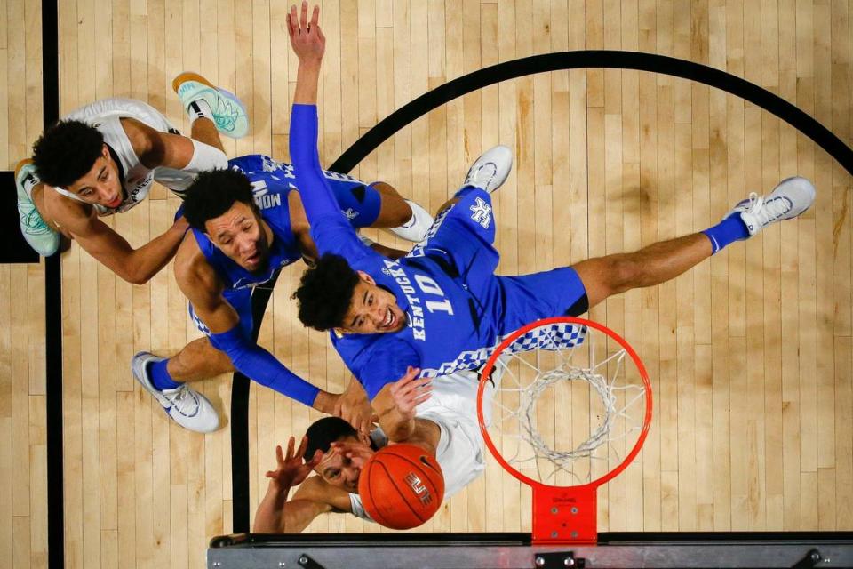 Johnny Juzang (10) shoots against Vanderbilt’s Dylan Disu during a game with Kentucky on Feb, 11, 2020.