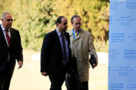 Head of opposition delegation for the Geneva IV conference on Syria Nasr al-Hariri (C) arrives at the United Nations office in Geneva, Switzerland, February 23, 2017. REUTERS/Pierre Albouy