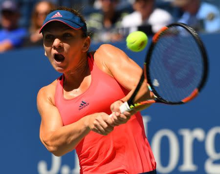 Aug 30, 2016; New York, NY, USA; Simona Halep of Romania hits to Kirsten Flipkens of Belgium on day two of the 2016 U.S. Open tennis tournament at USTA Billie Jean King National Tennis Center. Mandatory Credit: Robert Deutsch-USA TODAY Sports