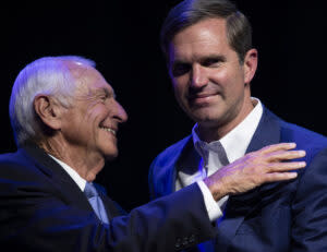  Gov. Andy Beshear and his father, former Gov. Steve Beshear, left, celebrated last year on election night. (Kentucky Lantern photo by Austin Anthony)