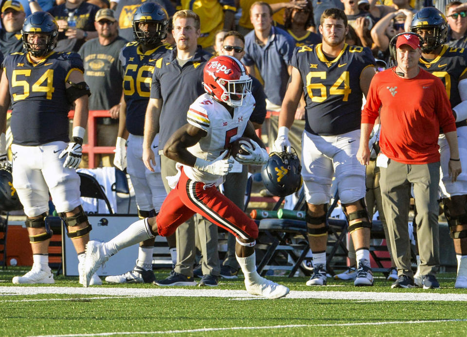 Maryland's Rakim Jarrett catches a pass for a touchdown against West Virginia during the second half of an NCAA college football game Saturday, Sept. 4, 2021 in College Park, Md. (Kevin Richardson/The Baltimore Sun via AP)