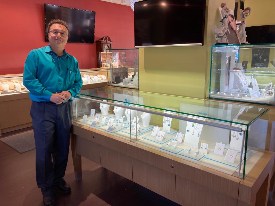 Louis Pacheco, owner of Pacheco's Jewelry in downtown Taunton, doubles his inventory for the holiday shopping season.