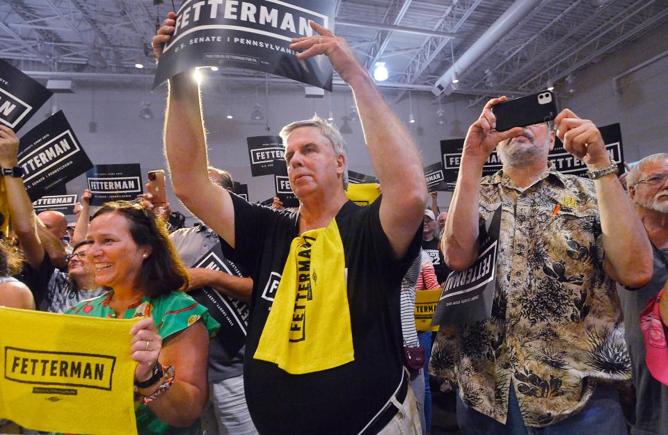 Supporters cheer for Pennsylvania Lt. Gov. and Democratic Senate nominee John Fetterman inside the Bayfront Convention Center in Erie on Aug. 12, 2022. It was Fetterman's first campaign event since suffering a stroke on May 13.
