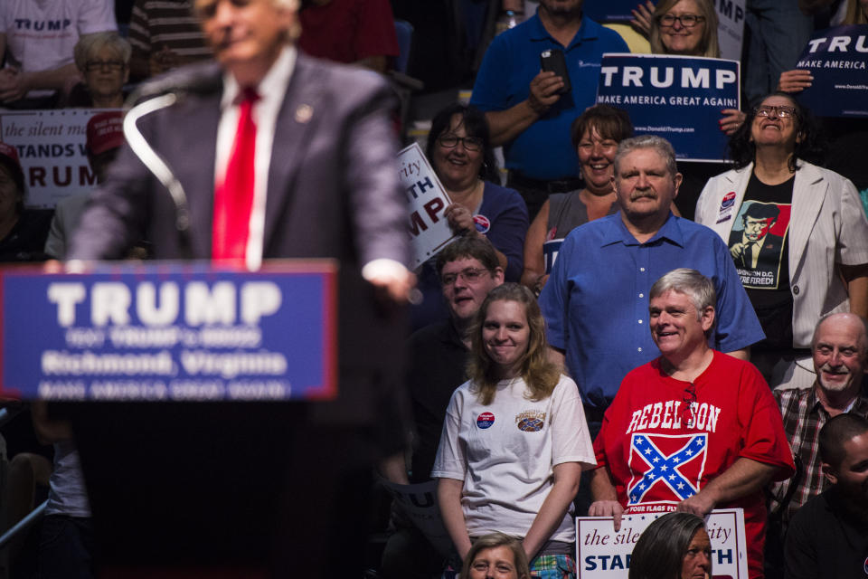 A supporter wears a Confederate flag shirt as Donald Trump speaks at a campaign rally on June 10, 2016, in Richmond, Virginia. (Photo: Jabin Botsford/The Washington Post via Getty Images)