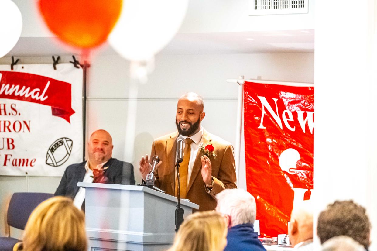 New Bedford 2023 Gridiron Club Hall of Fame Inductee, Amilton 'AJ' Tavares, speaks during the ceremony.