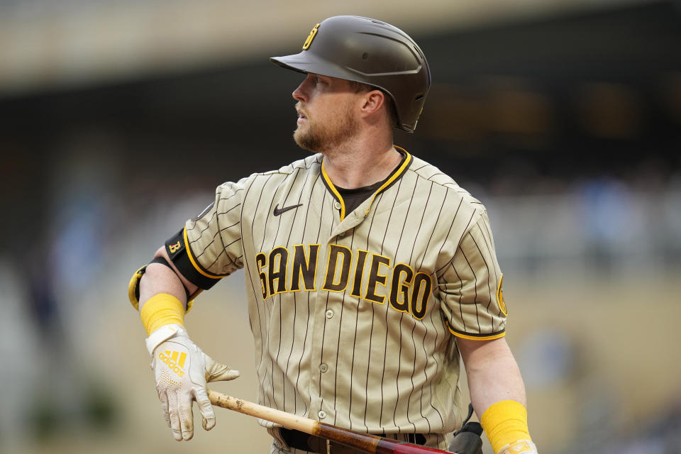 San Diego Padres' Jake Cronenworth reacts after striking out during the first inning of a baseball game against the Minnesota Twins, Tuesday, May 9, 2023, in Minneapolis. (AP Photo/Abbie Parr)