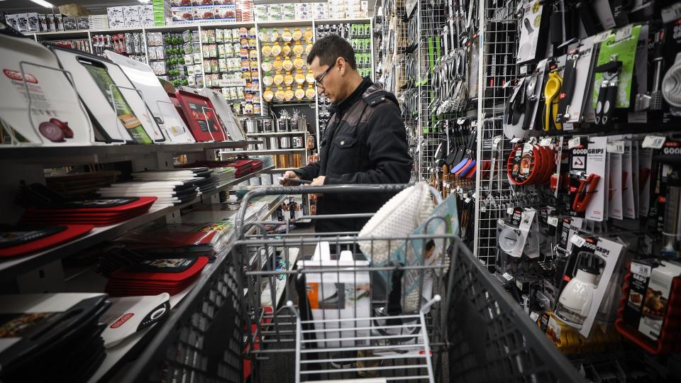 Man shopping in Bed Bath and Beyond