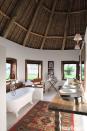 <p>In this <a href="https://www.housebeautiful.com/design-inspiration/house-tours/g1283/kenya-interior-design-1012/" rel="nofollow noopener" target="_blank" data-ylk="slk:bathroom in Kenya;elm:context_link;itc:0;sec:content-canvas" class="link ">bathroom in Kenya</a> by Suzanne Kasler, a vintage bathtub sits next to a vivid rug from a crafts market in Nairobi. The windows have canvas shades and zippered screens to thwart mosquitoes.</p>