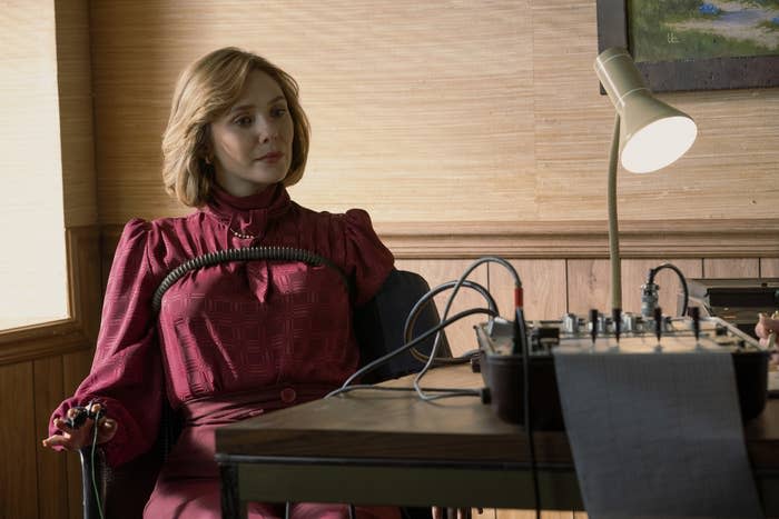 elizabeth olsen playing candy montgomery during a scene where she's taking a polygraph test in love and death