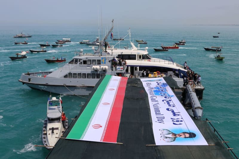 The Islamic Revolutionary Guard Corps (IRGC) warships and Iranian military speed boats of The Basij Resistance Force take part in the 'National Persian Gulf Day' at the Persian Gulf in Bushehr. Rouzbeh Fouladi/ZUMA Press Wire/dpa